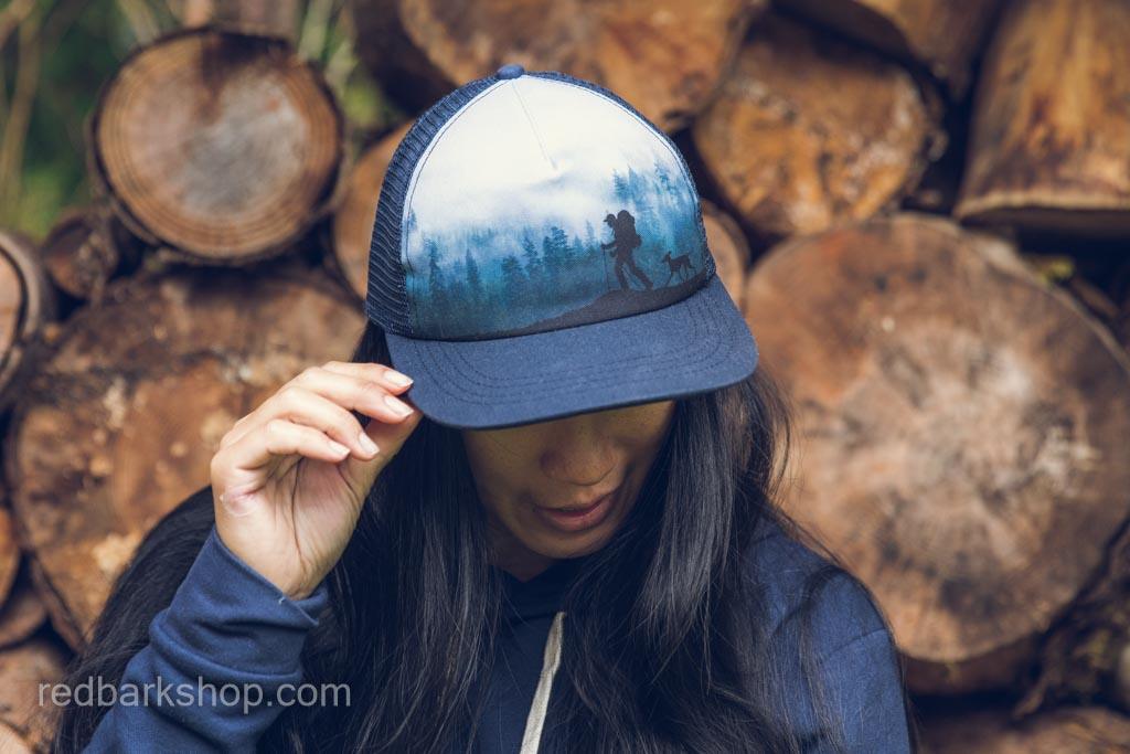 Navy blue cloudy mountain hiker hat on woman