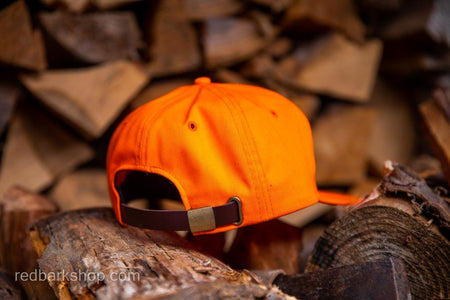 Back of blaze orange hunting hat
