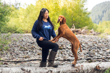 Woman with Vizsla wearing a Mountain Dog Sweatshirt in Navy