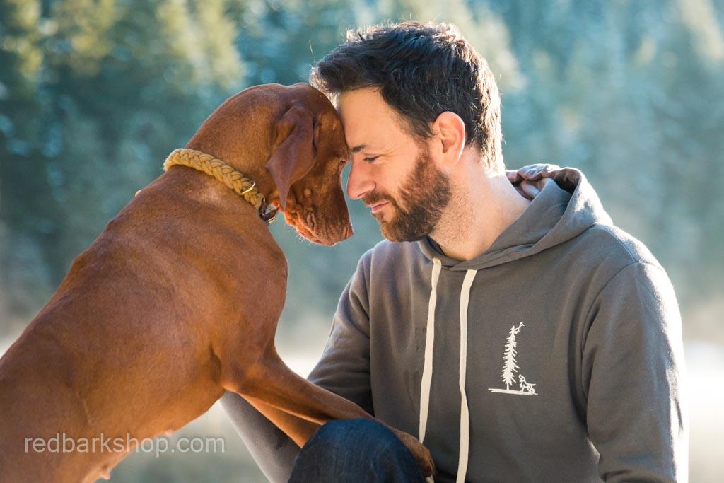 adventure dog trail hiker hoodie in grey with man modelling