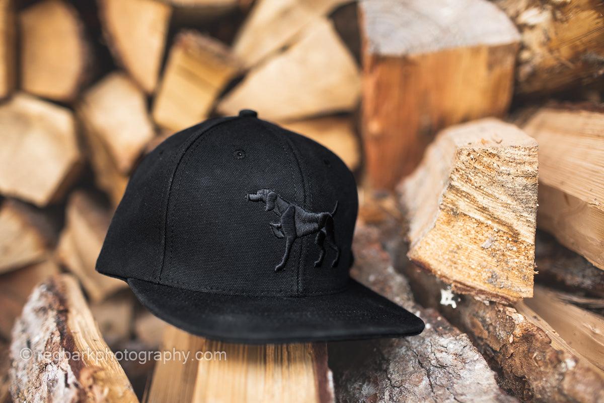 side view of Iconic Puff embroidery Pointer dog Hat in Black